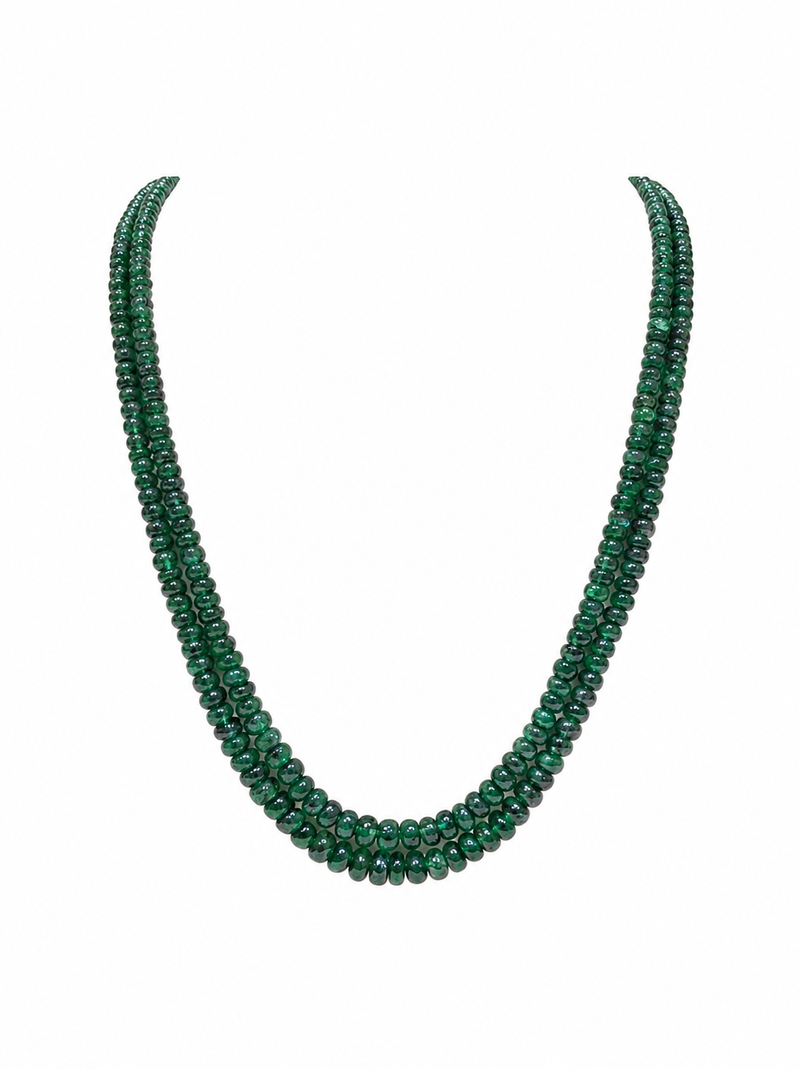 2 rows precious uncut emeralds