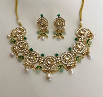 The emerald kundan necklace earring set 1