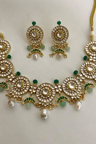 The emerald kundan necklace earring set