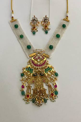 The royal peacock kundan necklace & earring set