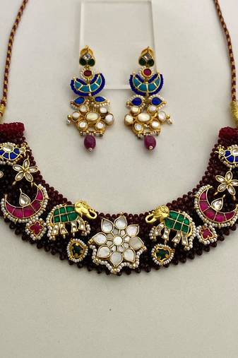 The peacock elephant kundan necklace & earring set