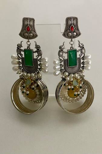 The regal elephant fusion earrings