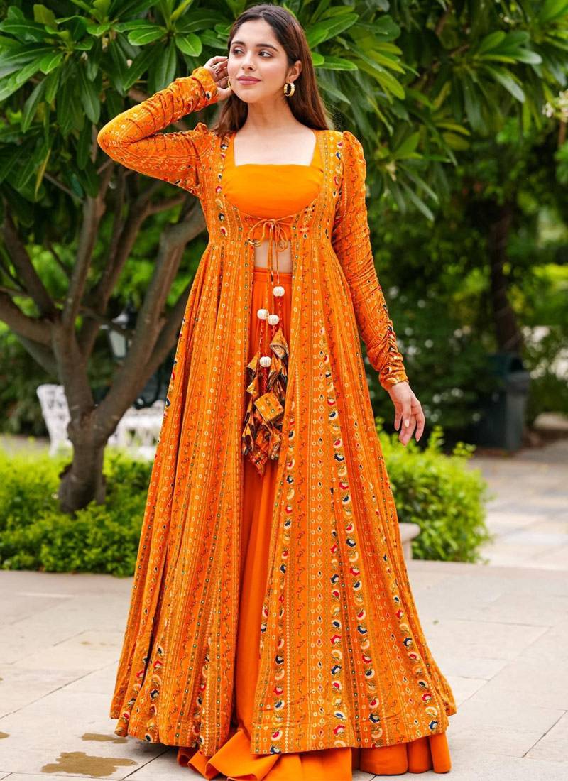 Orange digital print faux georgette sharara suit set with crop top & shrug stitched