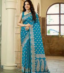 Teal blue satin silk blend woven saree with silver zari border & blouse