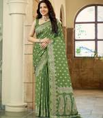 Green satin silk blend woven saree with silver zari border & blouse
