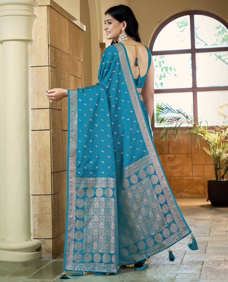 Teal blue satin silk blend woven saree with rich silver zari border