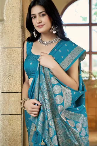 Teal blue satin silk blend woven saree with rich silver zari border