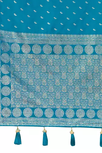 Teal blue satin silk blend woven saree with rich silver zari border