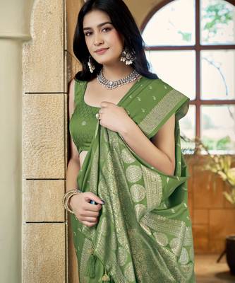 Green satin silk blend woven saree with rich silver zari border 3