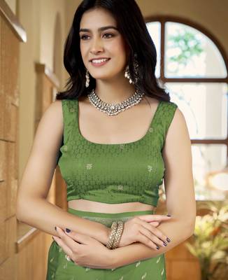 Green satin silk blend woven saree with rich silver zari border 4