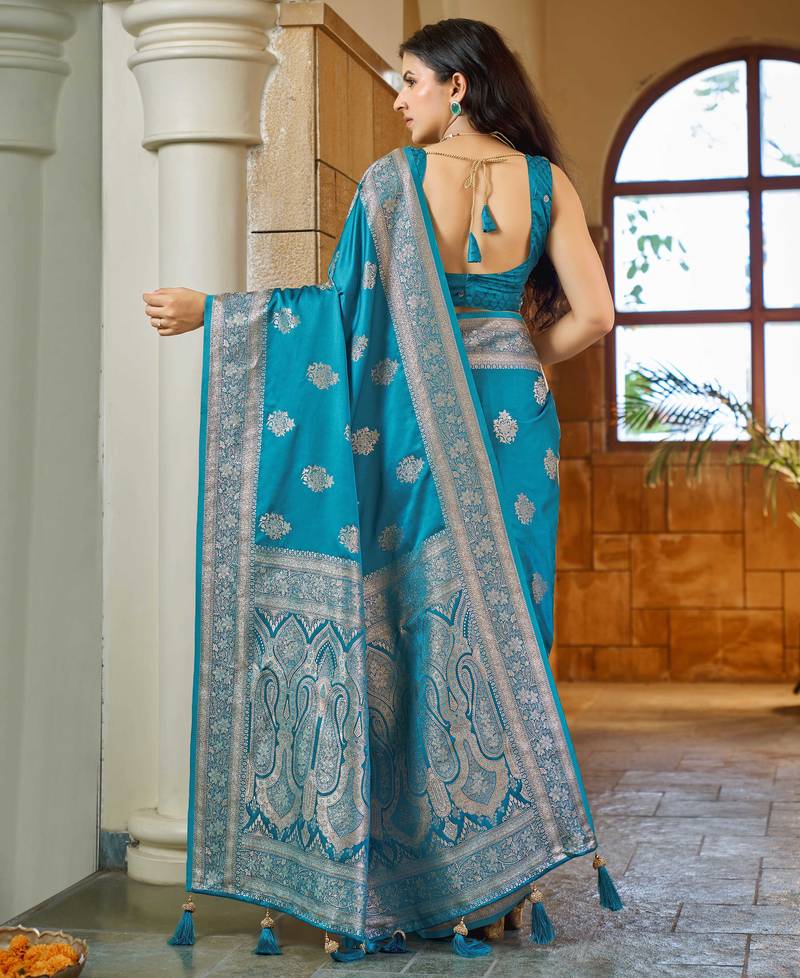 Teal blue silk blend woven saree with rich silver zari border & blouse