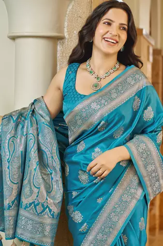 Teal blue silk blend woven saree with rich silver zari border & blouse