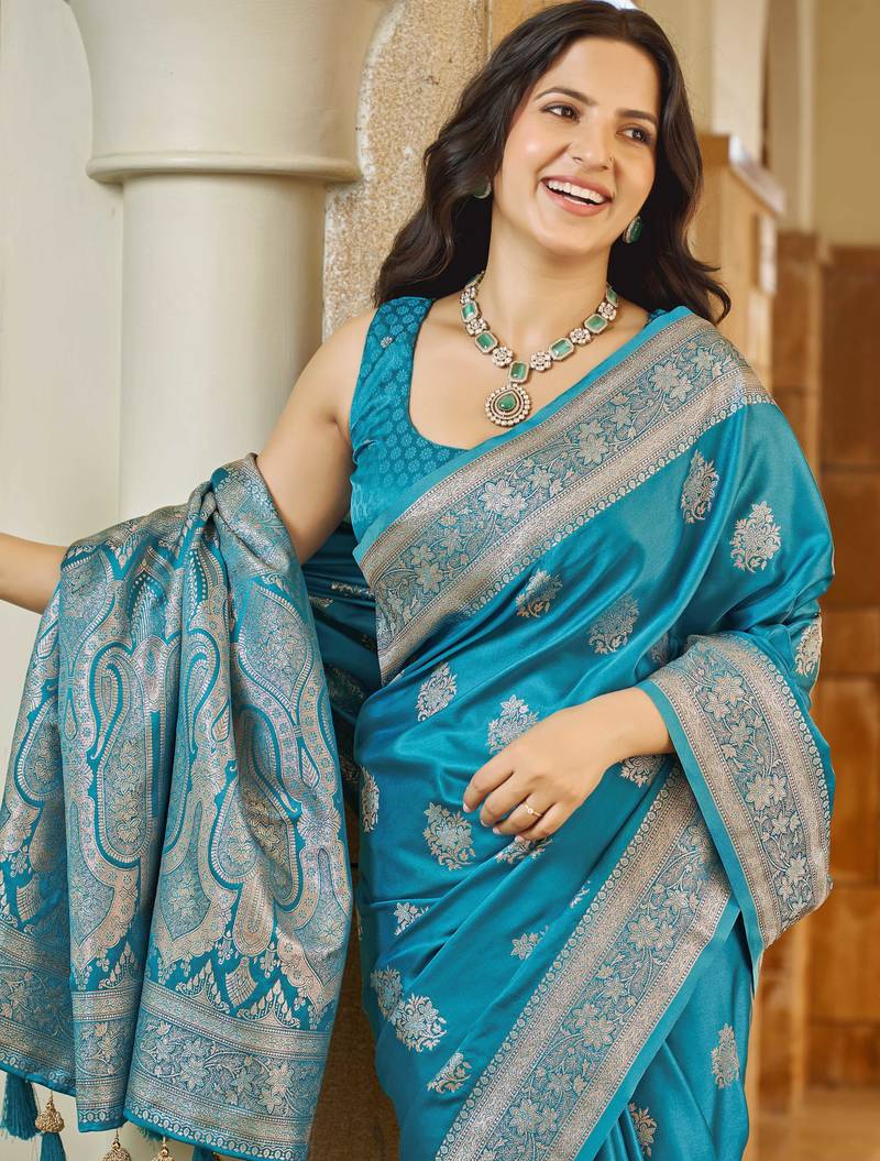 Teal blue silk blend woven saree with rich silver zari border & blouse