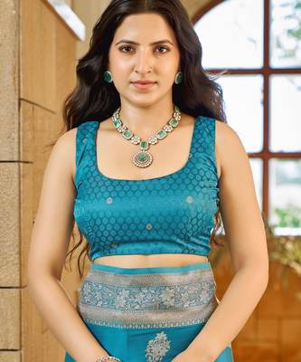 Teal blue silk blend woven saree with rich silver zari border & blouse 4