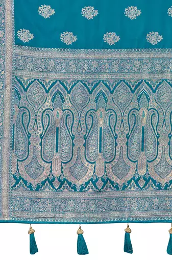 Teal blue silk blend woven saree with rich silver zari border & blouse