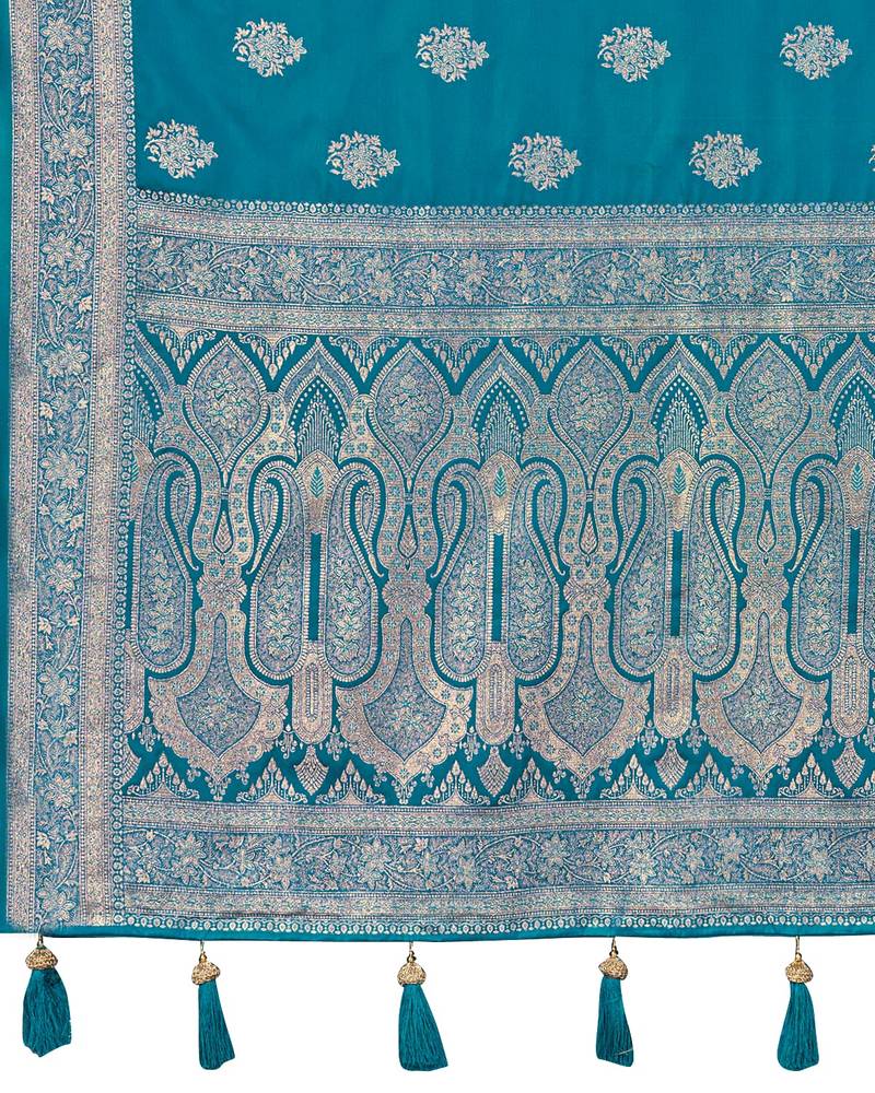 Teal blue silk blend woven saree with rich silver zari border & blouse