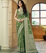 Green silk blend woven saree with rich silver zari border & blouse