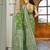 Green silk blend woven saree with rich silver zari border & blouse