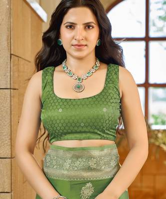 Green silk blend woven saree with rich silver zari border & blouse 4