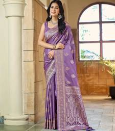 Purple silk blend woven saree with rich silver zari border & blouse