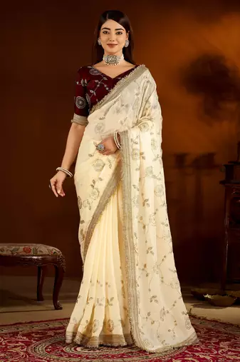 Beige color satin silk saree with maroon blouse heavy embroidered work