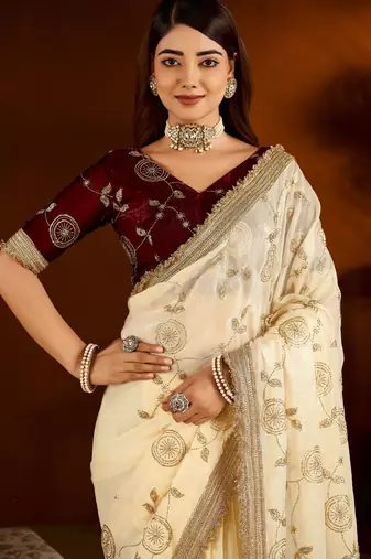 Beige color satin silk saree with maroon blouse heavy embroidered work