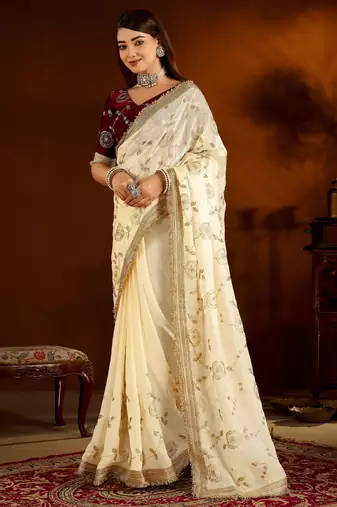 Beige color satin silk saree with maroon blouse heavy embroidered work