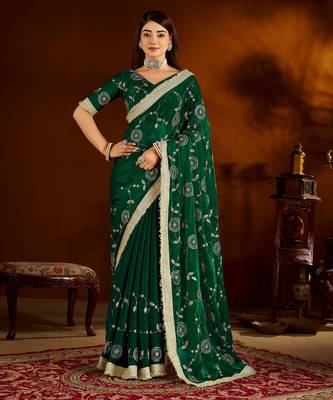 Green color satin silk saree with heavy embroidered work 1