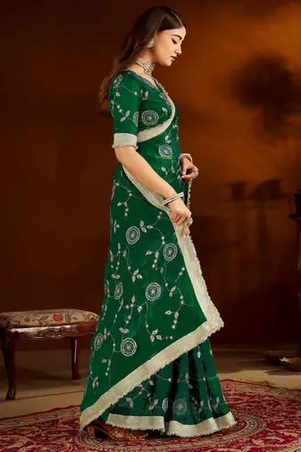 Green color satin silk saree with heavy embroidered work