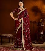 Maroon satin silk saree with heavy embroidered work