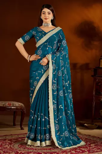 Rama green satin silk saree with heavy embroidered work