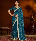 Rama green satin silk saree with heavy embroidered work