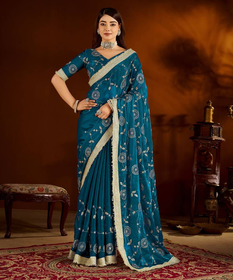 Rama green satin silk saree with heavy embroidered work