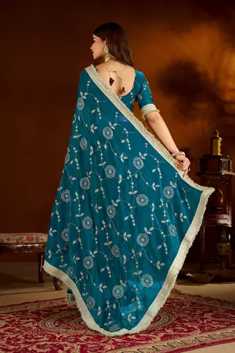 Rama green satin silk saree with heavy embroidered work
