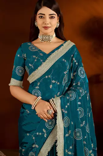 Rama green satin silk saree with heavy embroidered work