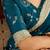Rama green satin silk saree with heavy embroidered work