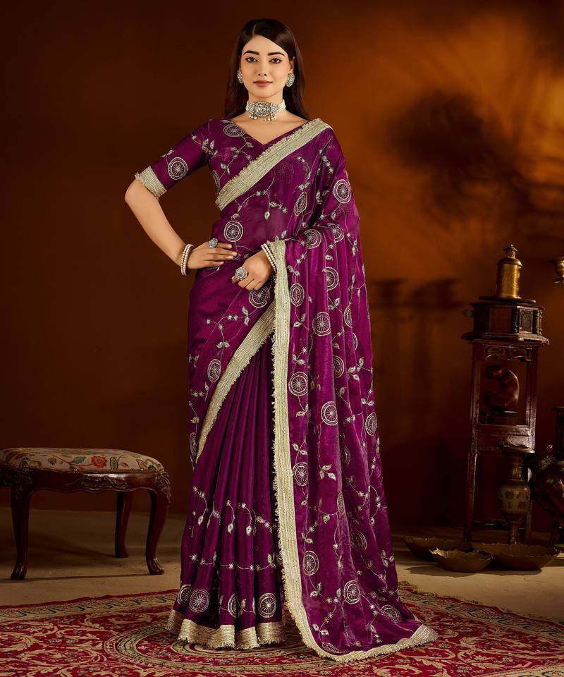 Wine satin silk saree with heavy embroidered work