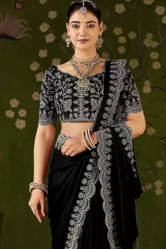 Black rangoli silk saree with embroidered designer blouse piece