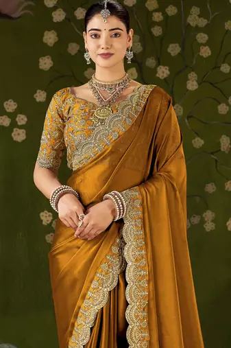 Mustard black rangoli silk saree with embroidered designer blouse piece