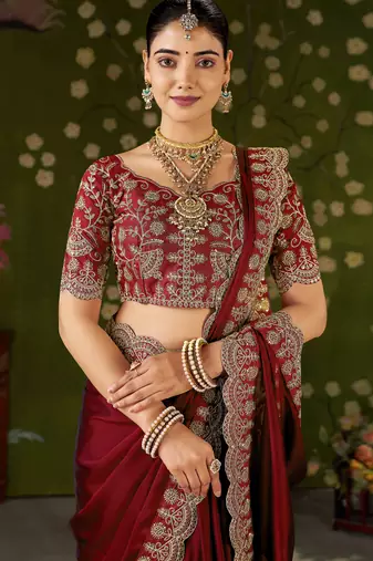 Red rangoli silk saree with embroidered designer blouse piece