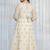 Designer white faux blooming anarkali gown with heavy zari embroidery & moti lace