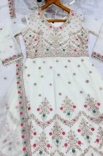 Designer white faux blooming anarkali gown with heavy zari embroidery & moti lace