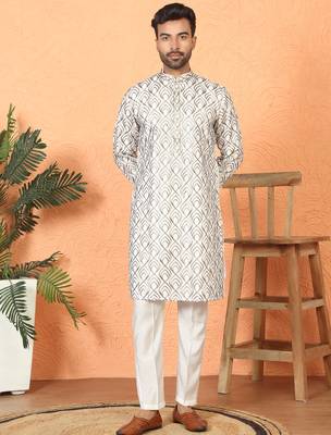 Cotton silk embroidered thread work cream kurta with trouser 1