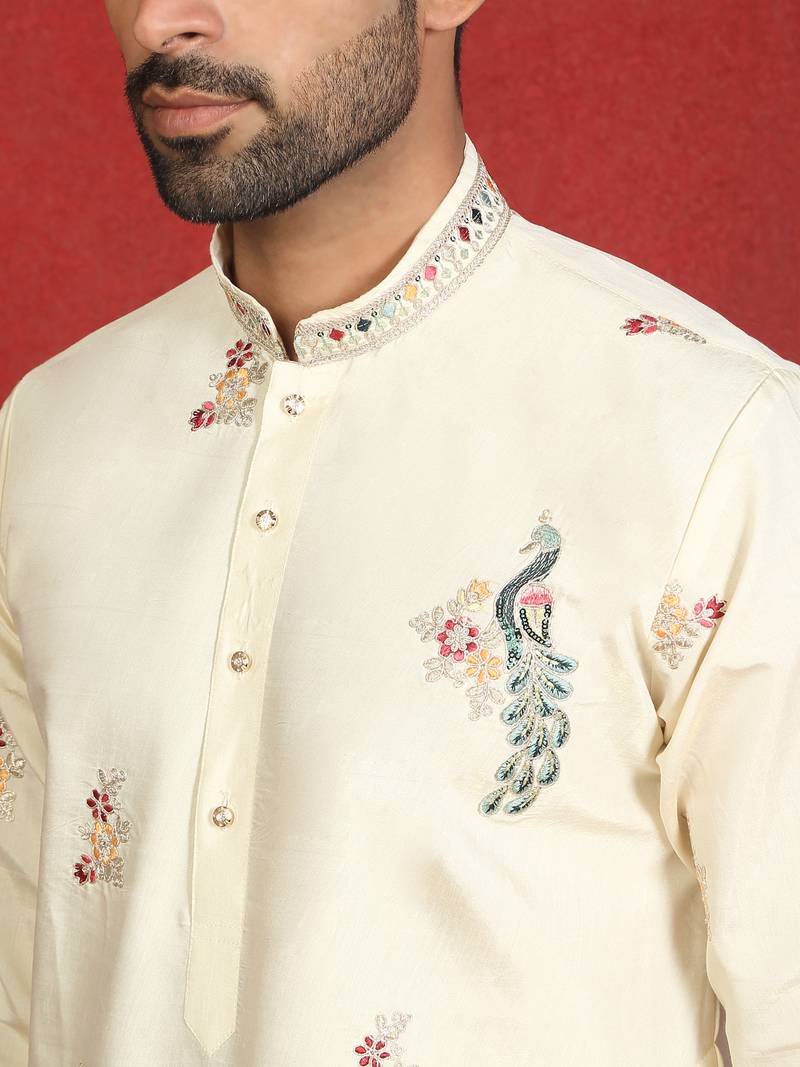 Cotton silk multi embroidered daman work cream kurta with salwar
