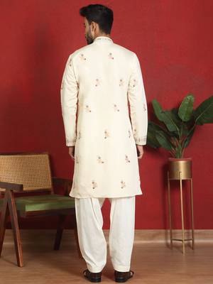 Cotton silk multi embroidered daman work cream kurta with salwar 3