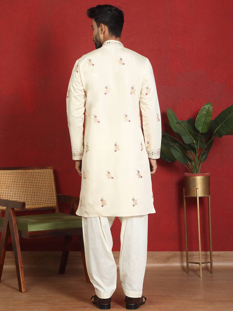 Cotton silk multi embroidered daman work cream kurta with salwar