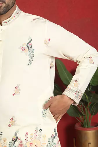 Cotton silk multi embroidered daman work cream kurta with salwar