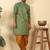 Silk blend jacquard paisley green kurta with mustard elastic dhoti