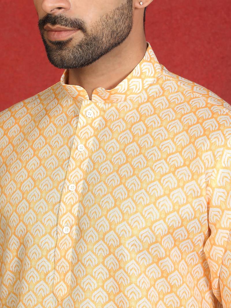 Cotton blend leaf printed knee length yellow kurta with elasticated pyjamas