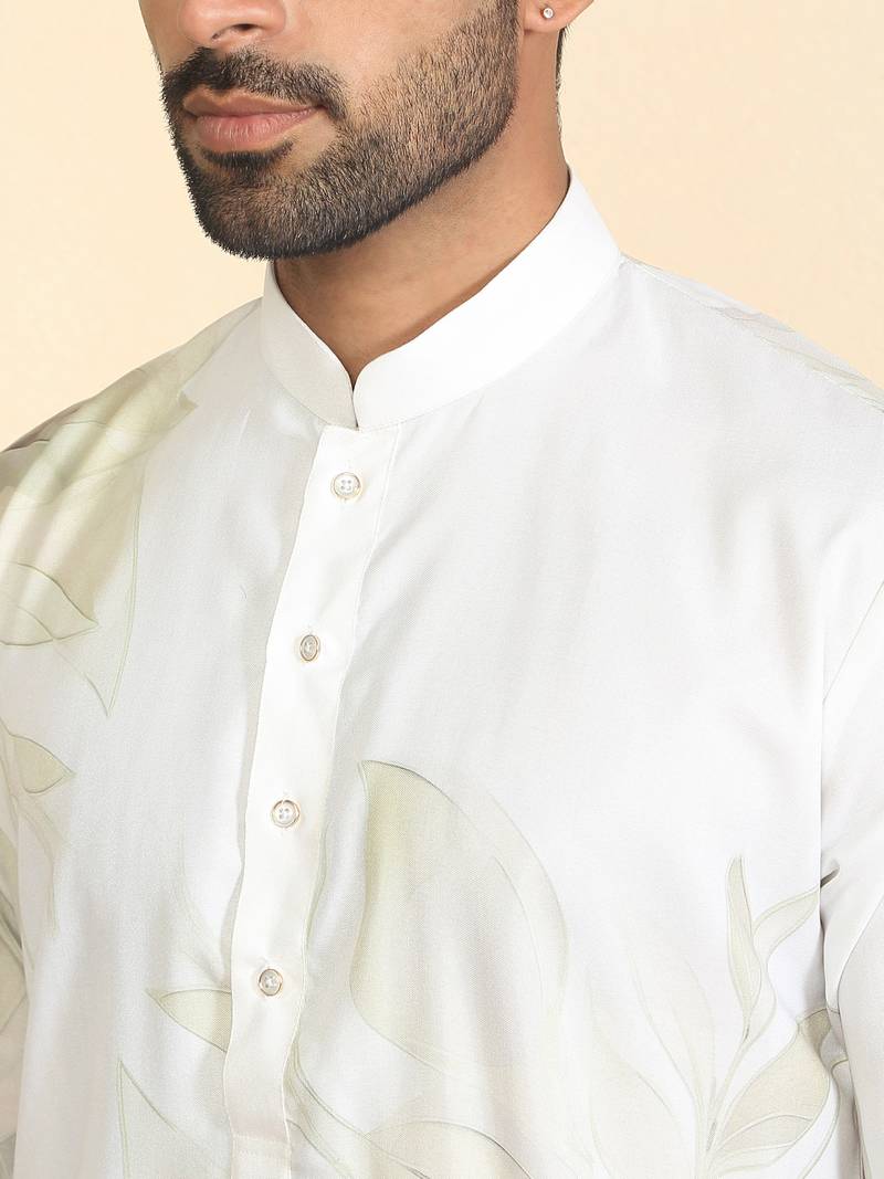 Leaf printed cotton blend straight green kurta with elasticated pyjamas